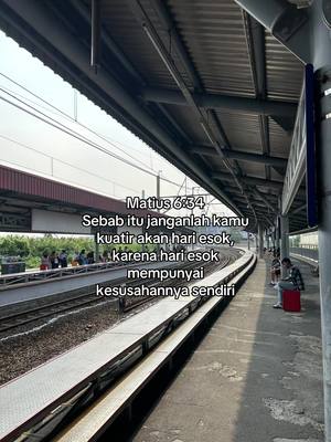 An exterior shot of a train platform with tracks and a covered walkway. The sky is overcast and the scene has a slightly muted color palette. Text is overlaid on the image providing a bible verse.
