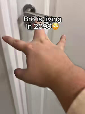 A close-up shot of a hand reaching for a door handle. The hand is in focus, while the background, featuring a door and wall, is slightly blurred. Text overlayed on the top-left suggests the theme or hook of the content.