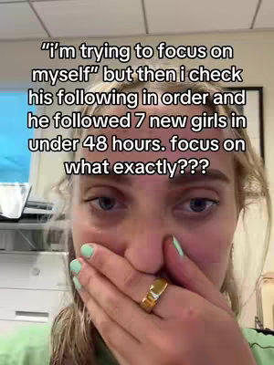 A close-up shot of a woman's face, her hand covering her mouth. Text overlays the image.