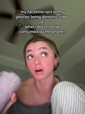 A young woman with fair skin and blonde hair is shown from the chest up, looking upwards with a surprised expression. She is holding a light purple drink in a clear cup in her left hand. The background includes a ceiling and part of a ceiling fan. Text overlays the image in a white, sans-serif font.