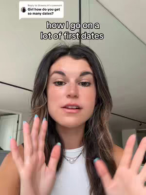 A woman with long, highlighted brown hair looks at the camera while holding her hands up. White overlay text reads, "how I go on a lot of first dates". Above her, a comment box reads: "Girl how do you get so many dates?"