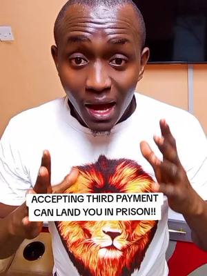 A man with short black hair and a white t-shirt stands in front of a plain background. His arms are raised with hands open, as if giving a presentation. His facial expression is serious. A text overlay in a white box at the bottom reads: ACCEPTING THIRD PAYMENT CAN LAND YOU IN PRISON!!