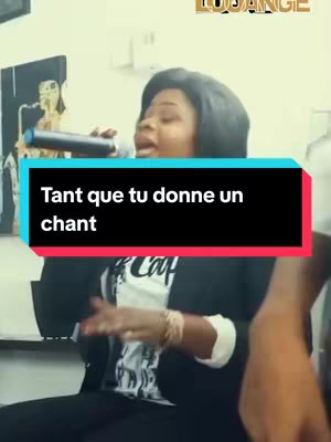 The cover image features a woman singing into a microphone. Text in a colored box is overlaid on the image. The background is blurred.