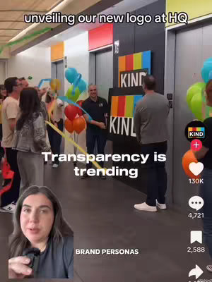 A woman is in the foreground filming with a microphone. In the background, people are gathered in front of a logo unveiling. Text overlays include marketing tips and brand transparency messaging.