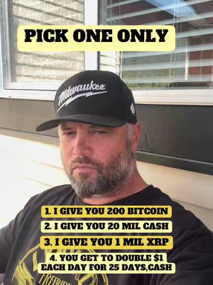A medium shot features a man in a black baseball cap and a black t-shirt. The cap has white text, and the man has a beard. Above the man's head is a yellow rectangle with black text "PICK ONE ONLY." Below lists four options: "1. I GIVE YOU 200 BITCOIN", "2. I GIVE YOU 20 MIL CASH", "3. I GIVE YOU 1 MIL XRP", and "4. YOU GET TO DOUBLE $1 EACH DAY FOR 25 DAYS, CASH."