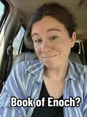 A woman is sitting in a car, looking at the camera and smiling slightly. Text overlaid on the image reads 'Book of Enoch?'. The car's interior is visible in the background.