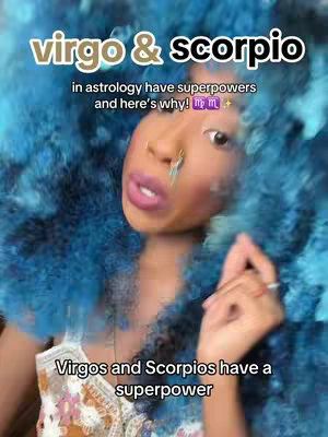 A selfie-style image featuring a person with vibrant blue, voluminous hair. The person is looking at the camera with a neutral expression, light makeup (pink lipstick), multiple nose piercings, and a slight smile. Overlaid text at the top says 'virgo & scorpio' with the '&' stylized. A smaller text overlay highlights the video's topic: Virgos and Scorpios have a superpower