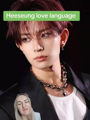 The cover image features a portrait of a male with auburn hair, likely a K-pop idol, with a green rectangular text overlay at the top. A smaller inset of a woman is positioned at the bottom of the image, and the background is a solid black color.