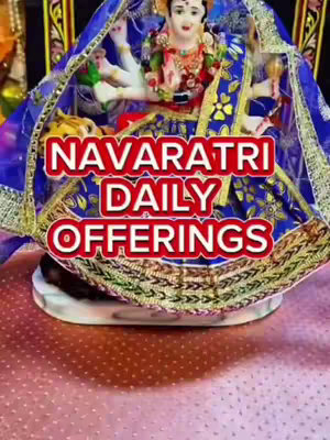 The cover image features a vibrant depiction of a deity, likely Durga, adorned in rich blue and gold attire. The figure is centered and slightly upward-facing, with multiple arms and a serene expression. Overlaying the deity is bold, red text highlighting offerings for Navratri. The overall composition is visually striking, the religious figure is over a pink background with small dots, conveying a sense of festive celebration and devotion.
