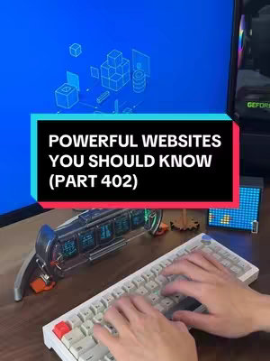 The cover image shows a person typing on a white mechanical keyboard. In the background, there is a computer monitor displaying a blue graphic, and various electronic devices on the desk. A text overlay in a black rectangular box at the middle of the image reads, "POWERFUL WEBSITES YOU SHOULD KNOW (PART 402)."
