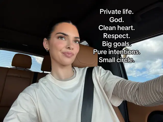A selfie taken from inside a car featuring Kendall Jenner in the driver's seat. She's looking off to the side, seemingly smiling. Text over the image spells out: Private Life. God. Clean heart. Respect. Big goals. Pure intentions. Small circle.