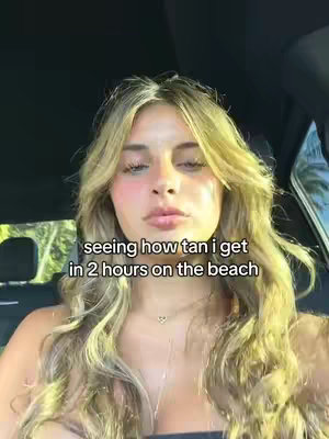 A selfie-style video cover image of a young, fair-skinned woman with long, wavy blonde hair, looking up towards the camera. She appears to be in a car, as the background shows a dark interior and a glimpse of greenery outside. The overlay text explains the video's content.