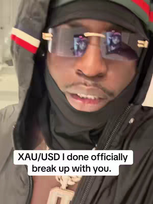 A close-up shows a man in sunglasses and a black hood and balaclava-style face covering, with text overlaid at the bottom.