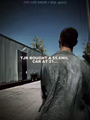 The cover image features a man from behind, standing in front of a building. Text overlayed appears at the bottom area of the image. The color scheme is subdued with natural lighting.