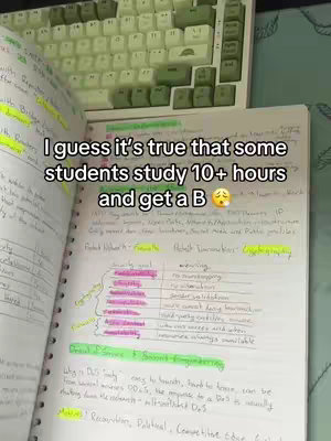 A close-up shot of an open notebook is shown on a desk, with a partly visible keyboard in the background. The notebook contains handwritten notes and highlighted sections. A text overlay says: I guess it's true that some students study 10+ hours and get a B.