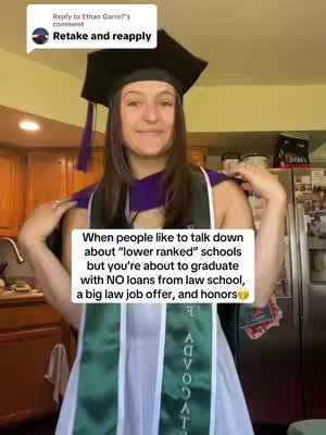 A young woman in a graduation cap and gown is the central figure, positioned in front of a blurred background. She is holding the sides of her gown, with a text box containing text.
