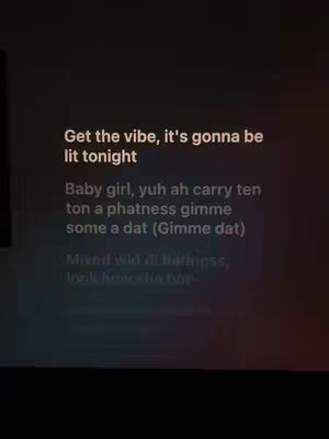 A dark image with overlayed white text. The text is arranged in a block, with lines of lyrics.