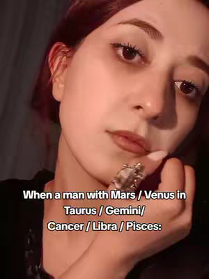A close-up shot features a person gazing slightly off-camera, with a ring prominently displayed on their index finger. The background appears blurred and dimly lit. Text overlays appear at the bottom of the main subject. The lighting suggests a natural or soft source, enhancing the facial details.