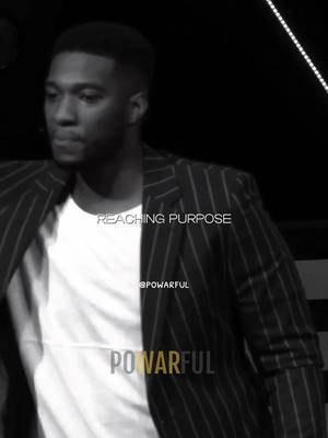 A monochrome image of a man in a blazer captured from the chest up against a dark backdrop. Text overlays highlight key concepts and branding.