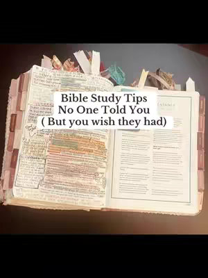 The image shows an open Bible on a dark surface. The pages are filled with handwritten notes and highlighted text, and the edges of the pages are marked with colorful tabs. A text overlay at the top of the image displays the video title.