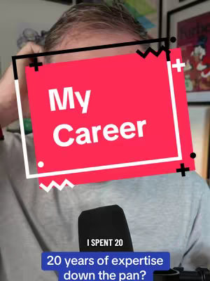 The image shows a man in a gray shirt, with a red rectangle overlaid with text "My Career" followed by a blue box with text "I SPENT 20, 20 years of expertise down the pan?".  The man is the main subject and it seems he is speaking on the camera.