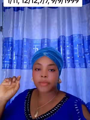 A woman with fair skin is centered in the frame, looking towards the camera. She wears a blue headscarf and a matching blue top with black trim. Behind her is a blue, patterned curtain. The hook text is present in the upper portion of the image.