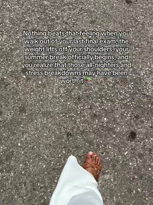 An overhead shot depicts a person's foot in a brown sandal stepping onto a gray asphalt surface. The person is seen from the ankles down, wearing white pants. Overlayed on the image is a block of text in white font, which describes the feeling of finishing a final exam and the relief of summer break beginning.
