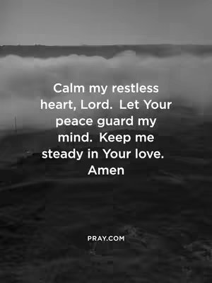 A grayscale image showcasing a serene, misty landscape, likely mountains or hills, with a layer of text overlayed. The text is a prayer or inspirational quote. The background has a soft, blurred look, and the text is centered.