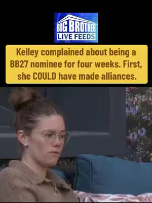 The image is a screenshot from a video featuring a woman with light skin, wearing glasses, and her hair pulled back in a bun. A text overlay in a yellow box is positioned at the top, covering a portion of the frame. The background has muted tones, with a glimpse of a floral pattern visible. The woman is looking down and to the left, appearing thoughtful. The overall composition is straightforward, focusing on the subject and text.