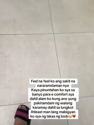 The image shows a close-up of a foot wearing a slipper with black, pink, and white stripes, placed on a light-colored tiled floor. Overlayed text is in a white rectangular box with rounded corners, conveying emotional sentiments.