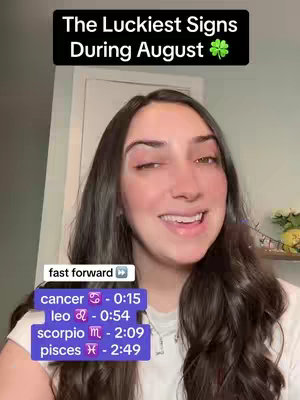 A medium shot of a woman smiling at the camera. The overlay text at the top says "The Luckiest Signs During August" in white text in a black box with a green clover.