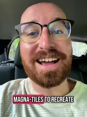 The cover image shows a close-up of a man's face with glasses, a beard, and an open mouth. Text overlayed on the bottom reads "MAGNA-TILES TO RECREATE". The background suggests the interior of a vehicle.