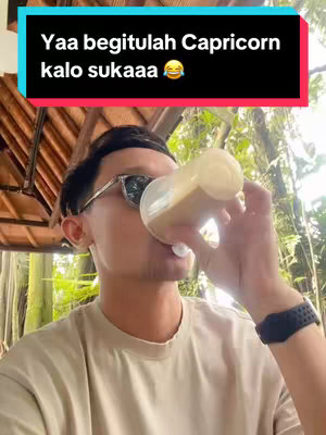A man wearing sunglasses is drinking from a bottle. A text overlay indicates the content discusses Capricorn.