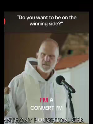 A man in a white robe with a white collar is speaking into a microphone. Above him, text reads "Do you want to be on the winning side?" and overlaid on the image are the words "I'M A CONVERT I'M".