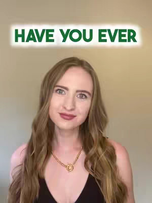 A woman with long blonde hair wearing a black top is looking at the camera with a neutral expression. Above her, the text \"HAVE YOU EVER\" is displayed in bold green letters outlined with a white glow.