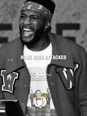A black and white image features a man in a black bandana and jacket, appearing to be emoting with his mouth open. Text overlayed on the image reads, "HAVE BEEN ATTACKED".