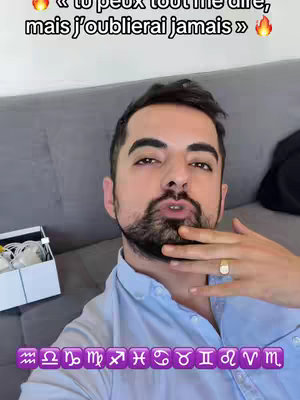 A man with a beard is taking a selfie while touching his lips with his finger, overlaid text and zodiac signs appear below him.