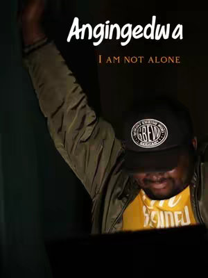 The cover image features a man in a dark setting, with the text overlayed in a creative design. The main figure is wearing a cap and a yellow t-shirt while he is raising his hand. The overall composition conveys a feeling of spiritual inspiration or encouragement.