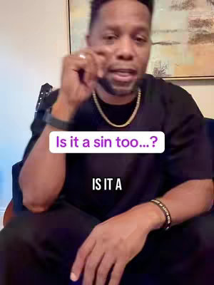 A man in a black shirt and gold chain is seated, looking towards the camera with a slight smile. Text overlays include a question 'Is it a sin too...?' in a white box with a purple outline.