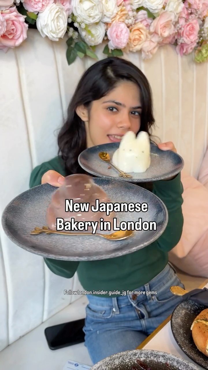 A woman in a green top and jeans holds two plates with Japanese pastries. The plates are set against a floral backdrop with text overlayed in the center.