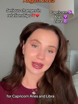 A woman with long brown hair and a burgundy top is speaking to the camera. Text overlays include the month, zodiac signs, and a callout about serious relationship changes.