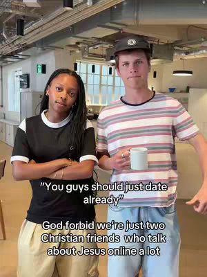A photo shows a young Black woman and a young white man standing next to each other in an indoor area. The woman, on the left, has her arms crossed, while the man on the right, has a white mug in his hand. Text appears over the image.