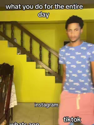 The cover image shows a young man centered in the frame, his gaze directed at the viewer. He wears a light blue shirt patterned with small white shapes and pink shorts. Behind him, a staircase ascends along a yellow wall, with text overlays indicating "what you do for the entire day" at the top, and app names like "instagram" and "tiktok" along the bottom.