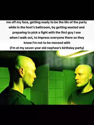 A split image of a man facing himself in a mirror or a similar reflective surface, positioned in a bathroom with green-tiled walls and overhead lighting. The man is bald, has pale skin, and is wearing a dark shirt. The lighting gives the scene a predominantly green hue. Text overlay appears above the image describing the man's thoughts and actions.