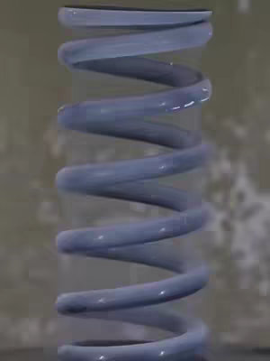 A vertical, close-up shot of a metallic-blue, coiled spring against a blurred, neutral-toned background. The spring is the central focus, with its spiraling form filling much of the frame. The texture appears smooth and reflective, possibly indicating a glossy finish. The background adds a subtle depth, offering a blurred sense of the setting. The lighting seems diffused, highlighting the form of the spring.