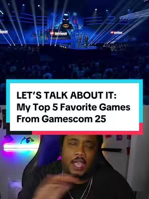 The cover image is a vertical video frame. In the foreground, a person is visible from the chest up, situated at the bottom. They are directly facing the camera, with shoulders appearing to be in a dark gaming chair and a necklace is visible around the neck. The background contains a large screen showing the Batman logo. The speaker is highlighted by the white highlighted text overlay that covers the background and part of the foreground. 