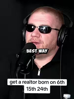 A man with short, reddish hair, wearing sunglasses and headphones, speaks into a microphone. The background is black, with text overlays in white and black.