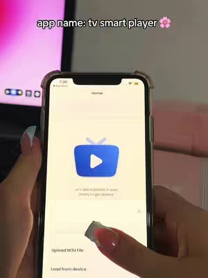 The cover image shows a person holding an iPhone displaying the 'TV Smart Player' app interface. The app's logo, a blue TV icon with a play button, is prominently featured. The background includes a blurred monitor and desk, suggesting an indoor setting. The person's hands are visible, interacting with the phone's screen.