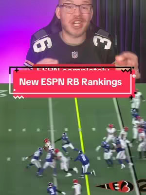 The cover image shows a man with glasses in a football jersey in front of a purple-black background. Overlaid on the image is a red banner with the text 'New ESPN RB Rankings,' along with footage of a football game from an overhead angle.