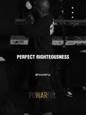 The image is a grayscale video still. The foreground features a person dressed in dark clothing singing into a microphone. Text overlays include the phrases "PERFECT RIGHTEOUSNESS" and "POWARFUL" with the creator's @ handle interspersed. In the background are blurred elements that suggest a stage setup with musical equipment